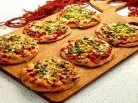 طرز تهیه پیتزا رولی با خمیر فینگرفود مجلسی و شیک